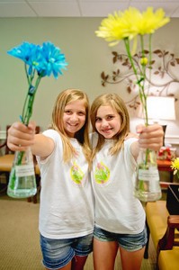 Lexi Thomas (left) and Abby Levin have collected more than 700 “likes” on their Flowers for Powers Facebook page. (Photos by David Stuck)