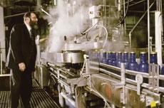 An OU mashgiach offers kosher supervision to a local factory. The OU operates in 50 states and in 80 countries.(Courtesy of the OU)