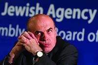 Jewish Agency head Natan  Sharansky, shown at a Jerusalem conference in June 2011, has been tasked with finding a solution to the  growing battle over women's prayer restrictions at the Western Wall. Miriam Alster/Flash90/JTA 