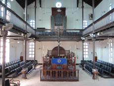 Shaare Shalom Synagogue, with its sand-covered floors, is Jamaica’s only shul and has fewer than 200 members.