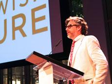 Michael Chabon accepts an achievement award from the Foundation for Jewish Culture in June 2013. (Shulamit Seidler-Feller)