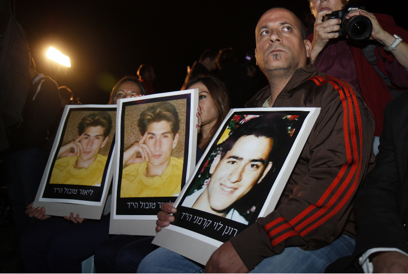 Photos of the terror victims were on display at a protest by Israeli families against the release of Palestinian prisoners. Source: Tazpit News Agency