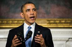 President Barack Obama celebrates a victory in Geneva; analysts are not so sure. (T.J. Kirkpatrick/Bloomberg)