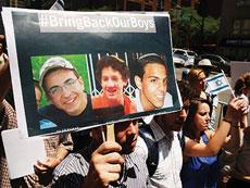 People gather for a vigil for the three Israeli teens outside the  Israeli Consulate on June 16.