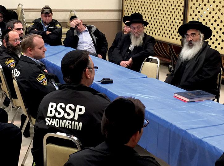 The Dushinsky Rebbe, Rabbi Yosef Tzvi Dushinsky, addresses Shomrim members in December 2014. (Photo David Stuck)